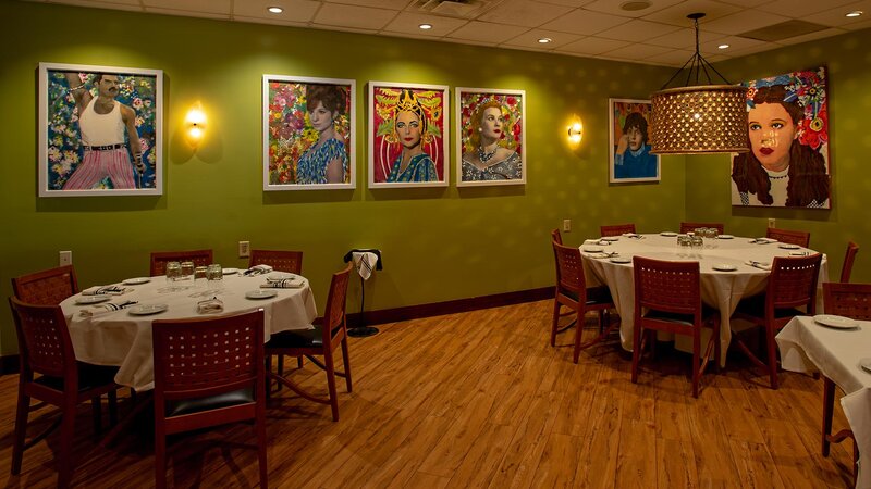 Rear dining room. Two tables for six.