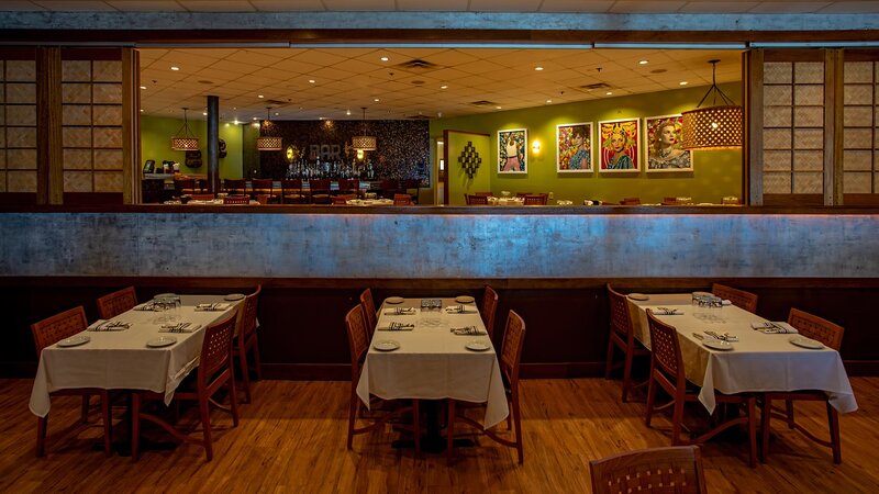 Dining room. Three tables set for four.