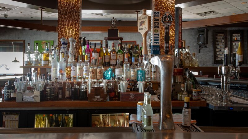 Bar area with liquor bottles and beer taps